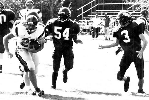 TRA's Tyler Sutton runs for a first down.