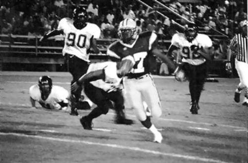 Michael Grandberry breaks loose for a big gain against Millington.