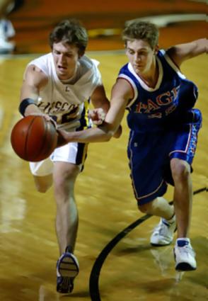 David Lipscomb's Anthony Hopkins, left, and Page's Matt Bowling chase a loose ball in the first half at Lipscombs Allen Arena.