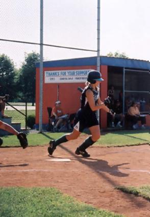 Monica West (C) hitting ...