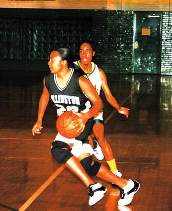 Millington's Amber Bacon drives to the basket.