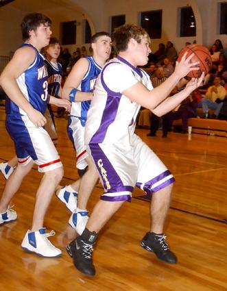Joe Hendrickson grabs a rebound.