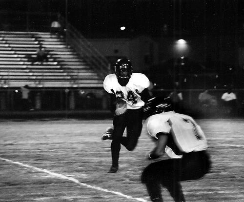 Millington's Cortez McGregor returns the Kirby kickoff for a big gain.