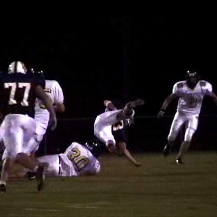 Lawrence Co- #3 Derek Dollar is upended after a big gain