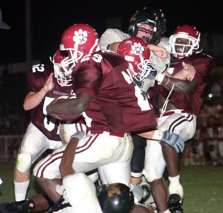 Cougar Jeremy Williams scores on a two yard run.