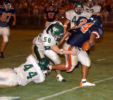 Kingston RB Chad Johnson struggles forward.