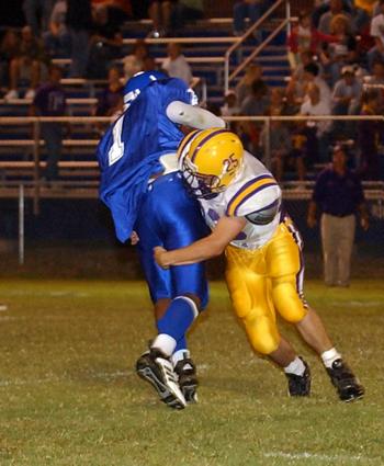 OS safety Nick Sweet brings down Harriman's Julian Goins.