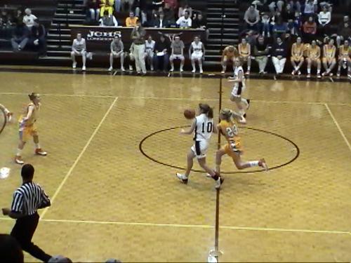 #23 CHRISTINA HOWARD TIPS THE BALL AWAY IN THE FINAL SECONDS OF THE CONTEST...