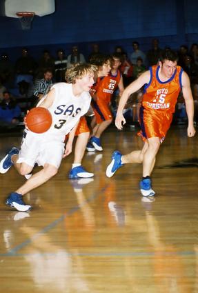 Jett Fisher Drives against Boyd Christian