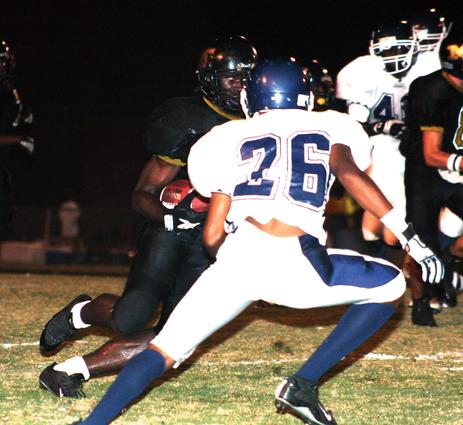 Miguel Barnes makes a cut back against Kirby.