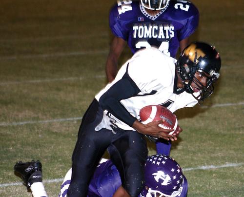 Trojan receiver Jerry Cormier catches a 10-yard touchdown pass.