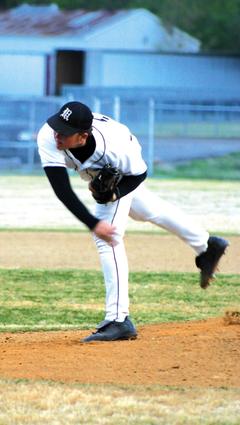 Millington's Zane Adams warms up before the game.