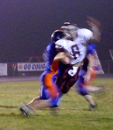 Brian Slover playing at FS instead of his usual MLB spot, levels an Indian to cause an incompletion.