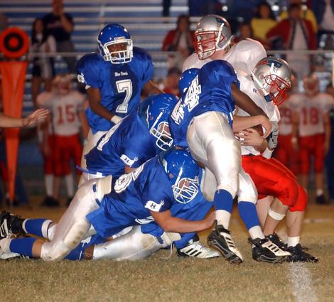 Harriman's defense stuffs a Union County runner.