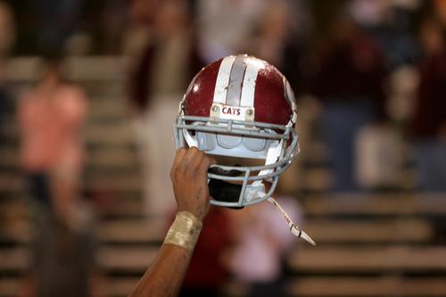 OR holding their helmets high!