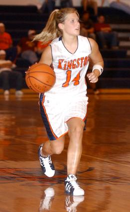 Kingston's Lindsey Cole heads down court.
