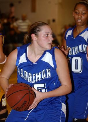 Harriman's Brittany Swicegood pulls down a rebound.