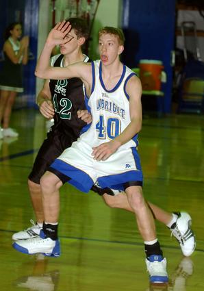 Sunbright's Kreis posts up against Rockwood.