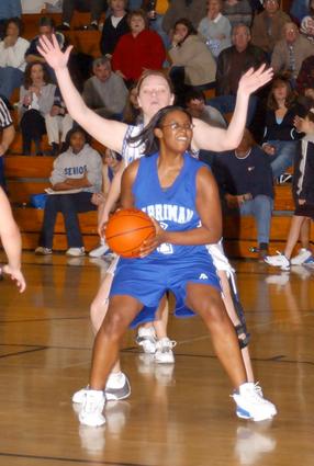 Ashley Fuqua receives a pass in the lane.