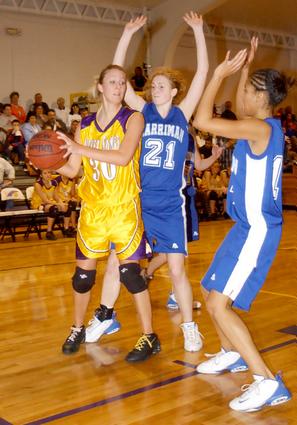 Casee Wampler looks for an open teammate.