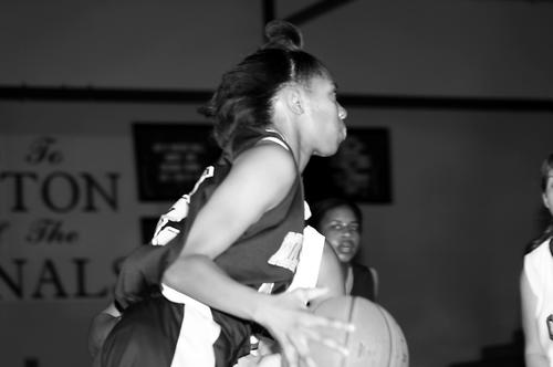 Michelle Malone of Millington drives baseline during the Lady Trojans' 67-62 win over Brighton.
