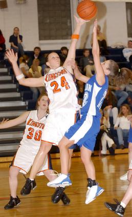 Brittany Webb and Sarah Cupp battle for the ball.