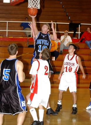 Dustin Baker shoots for Harriman.