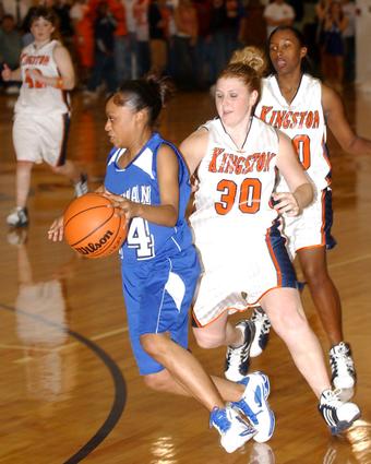 Harriman's Tiffany Pendergrass moves past Kingston's Kayla Parks.
