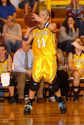 Oliver Springs' Brooke Barger shoots a three-pointer.