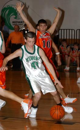 Midway's Jeremy Woody makes a move in the post.