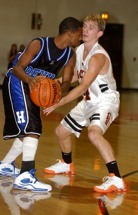 Coalfield's Michael Gilbert looks to make a play on defense.