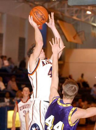 Derek Rogers shhots a jumper.