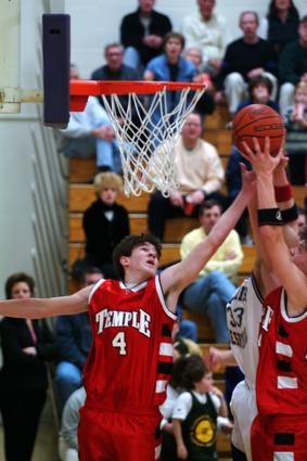 A Temple Player Snags a Rebound