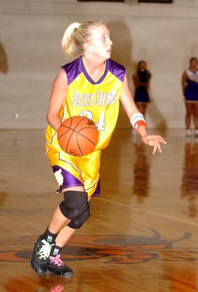 Kara Monk heads up court.