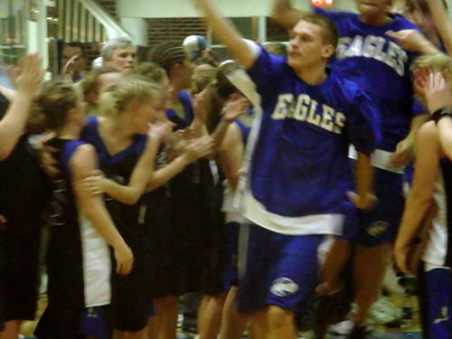 Kevin Hall leads the Eagles onto the floor