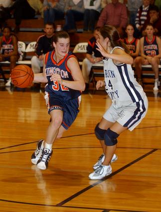 Kingston freshman Brooke Gentry drives past an AC defender.