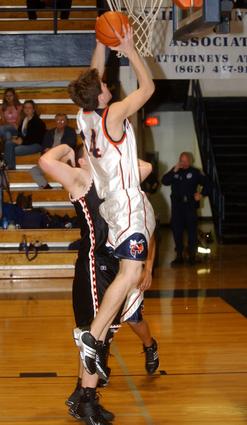 Kingston's Derek Rogers puts up a lay-up.