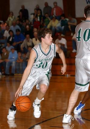 Rockwood's Michael Gilmore goes around a pick.