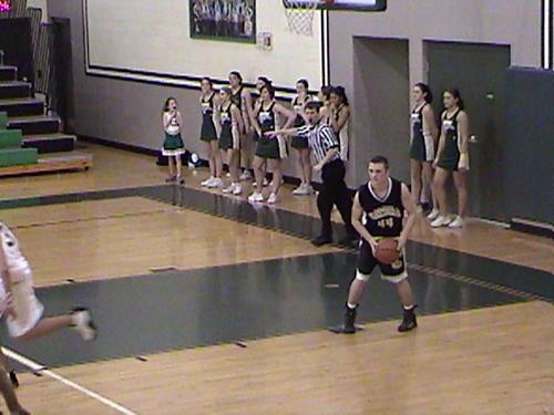 Bulldog #44 Jr. Michael Miller makes a pass.