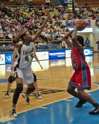 Dyersburg's Latroya Mitchell goes for the block.