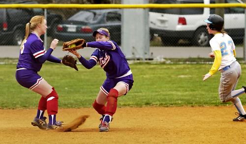 Emily Miller and Dianne Shelton devour a line drive