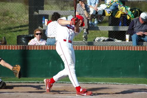 Junior lefty Kyler Burke hits a double off the wall