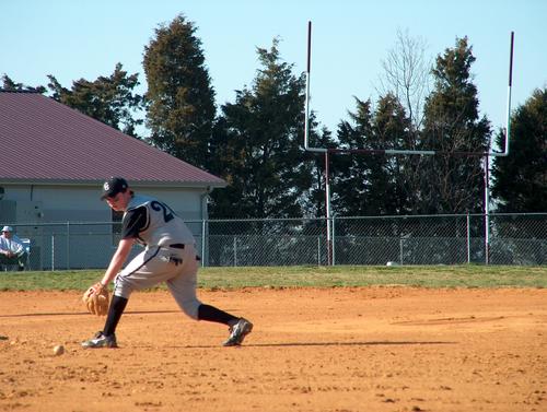 Panthers 2nd baseman Tyler Cosby goes after ground ball in  12-10 win  over South Green