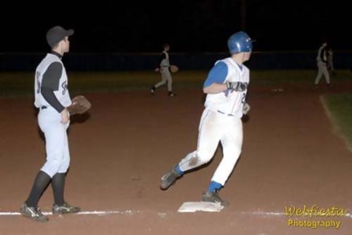 Corey Herald rounds third base