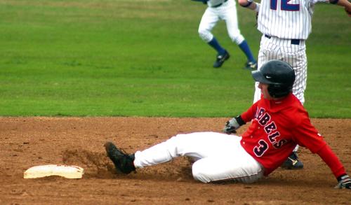 Trey Gish is safe at second against Harding Academy.