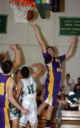 Adam Carter goes up for two of his game-high 24 points against Rockwood.
