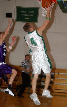 Derek Townsend shoots a lay-up for Midway.