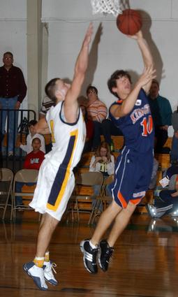 Kingston's Ryan Odom shoots a lay-up.