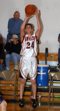 Kingston's Corey Jones shoots a three-pointer.