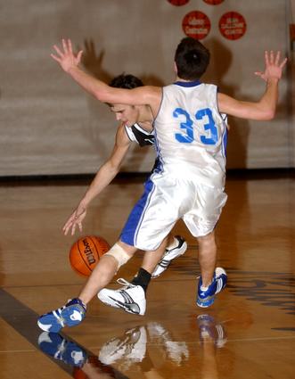 Wartburg's Adam Vespie looks to take a charge.